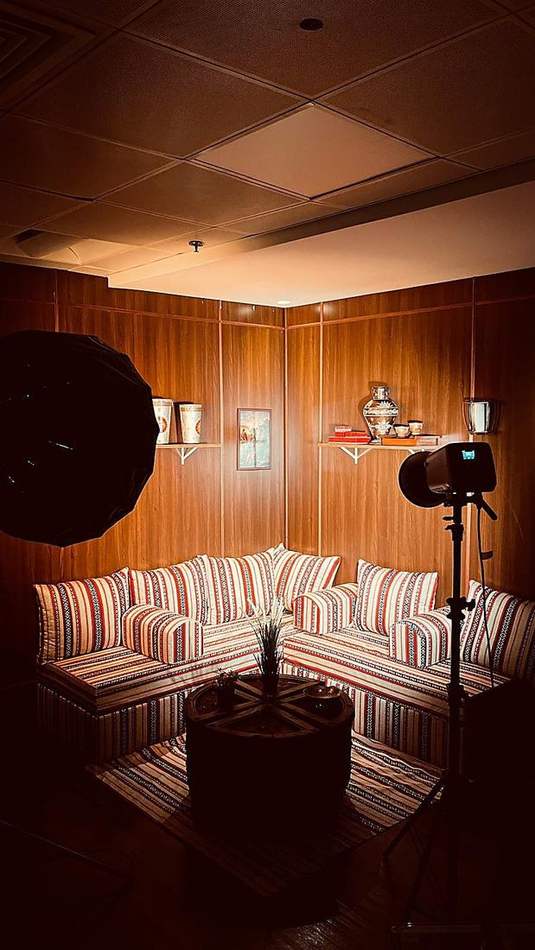 Majlis corner set up for a shoot with studio lighting